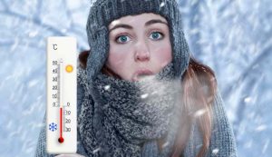 Illustrazione di una ragazza che muore di freddo (Canva FOTO) - energycue.it
